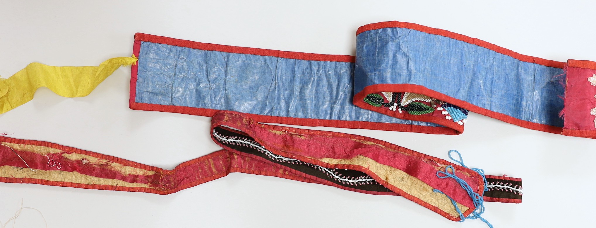 A 19th century North American bead worked tie and wider bead worked panel, possibly made as a belt, (2)